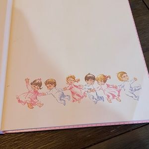 Vintage pink baby book for girl